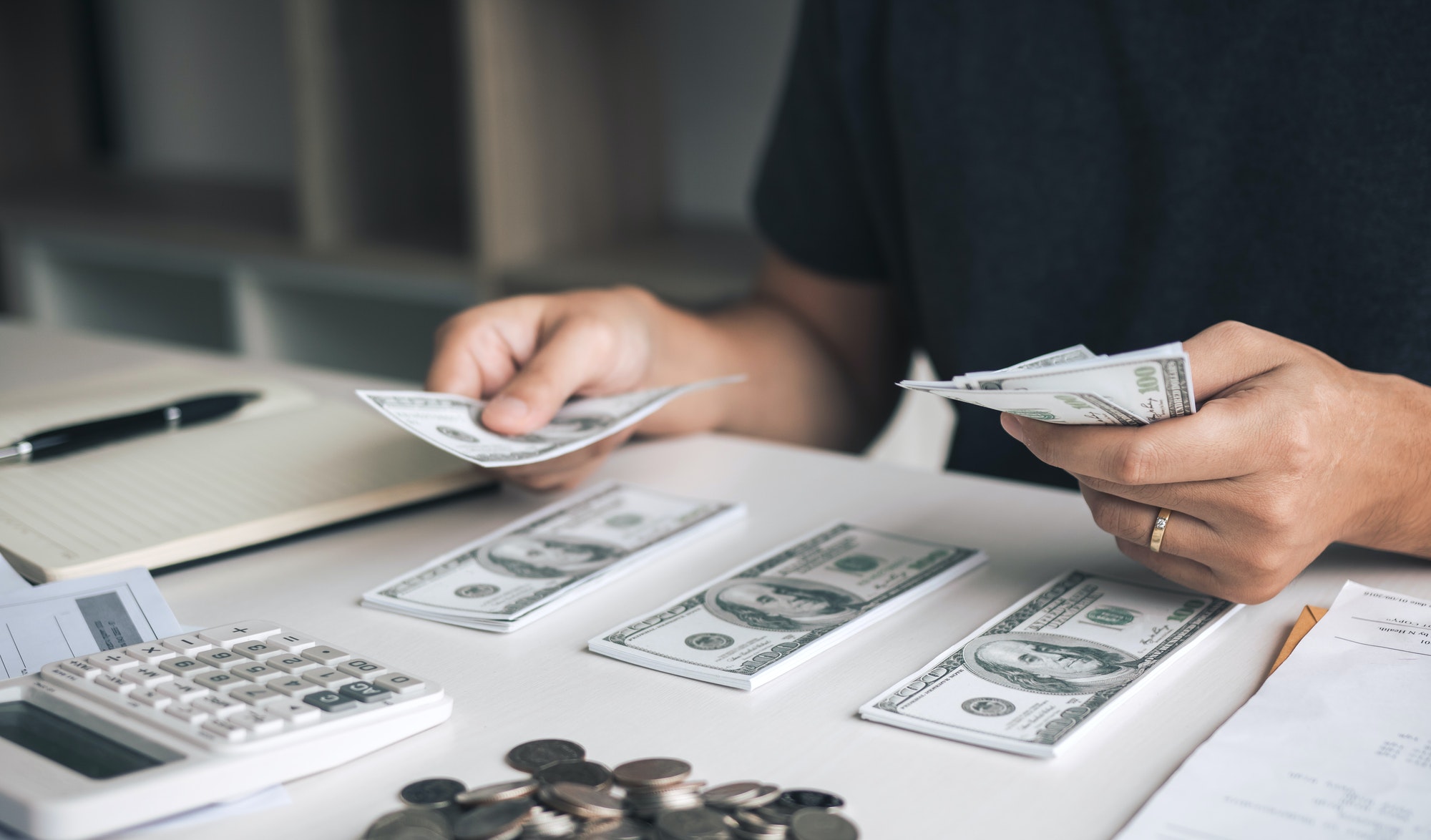asian-men-are-holding-banknotes-in-cash-and-placed-on-the-table-with-the-idea-of-saving-money-.jpg asian-men-are-holding-banknotes-in-cash-and-placed-on-the-table-with-the-idea-of-saving-money-.jpg
